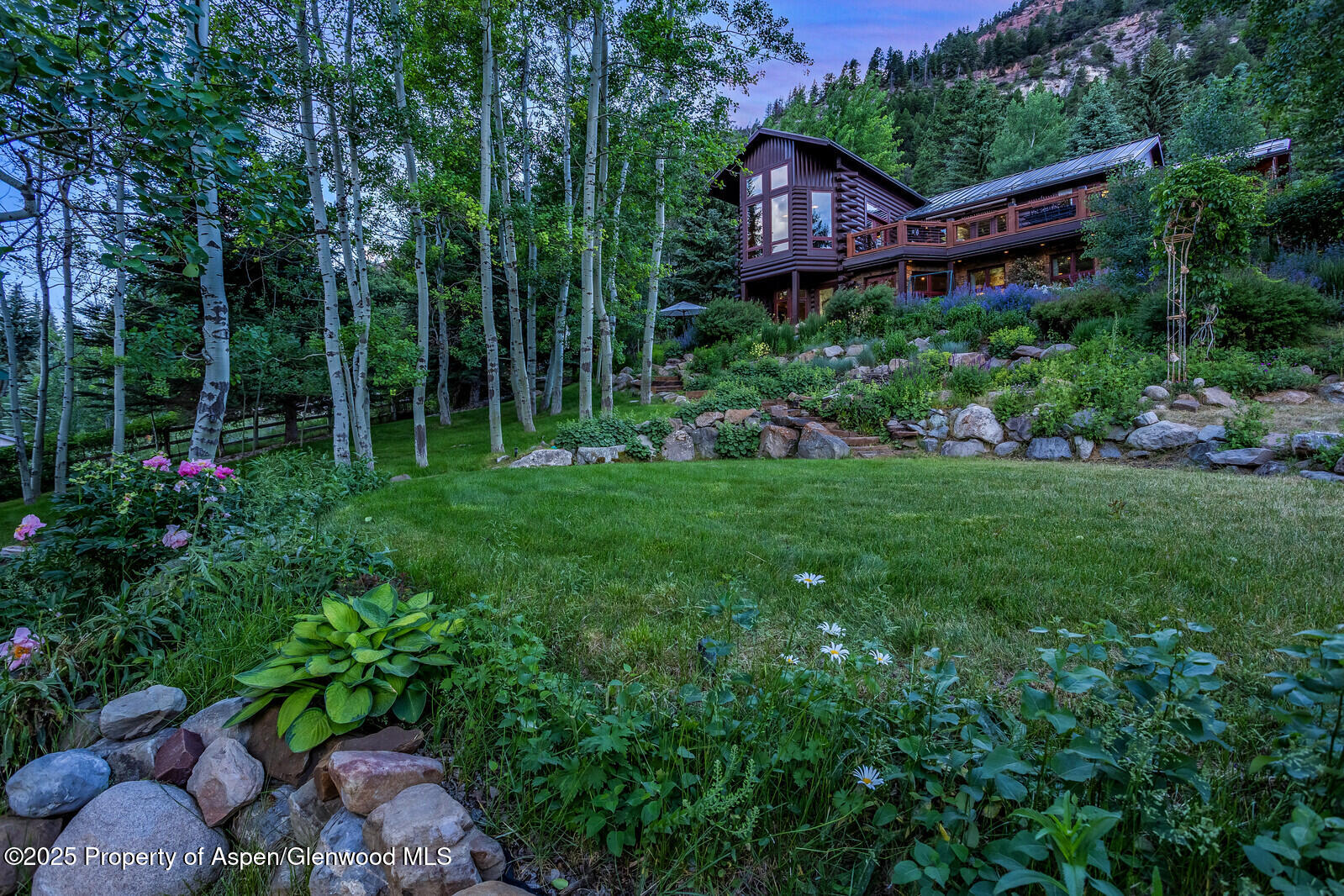 389 Elk Mountain Drive Redstone, CO 81623 - Photo 7 of 64 a view of a house with a backyard and garden