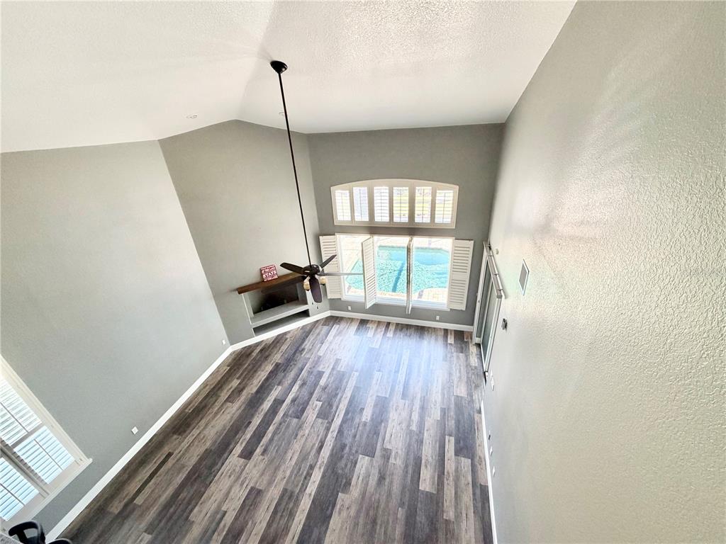 5243 West Lake Butler Road Windermere, FL 34786 - Photo 11 of 43 a view of hallway with wooden floor and stairs