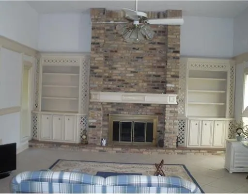a living room with a fireplace