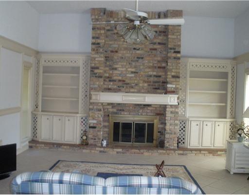 7026 Brandon Drive Corpus Christi, TX 78413 - Photo 4 of 10 a living room with a fireplace