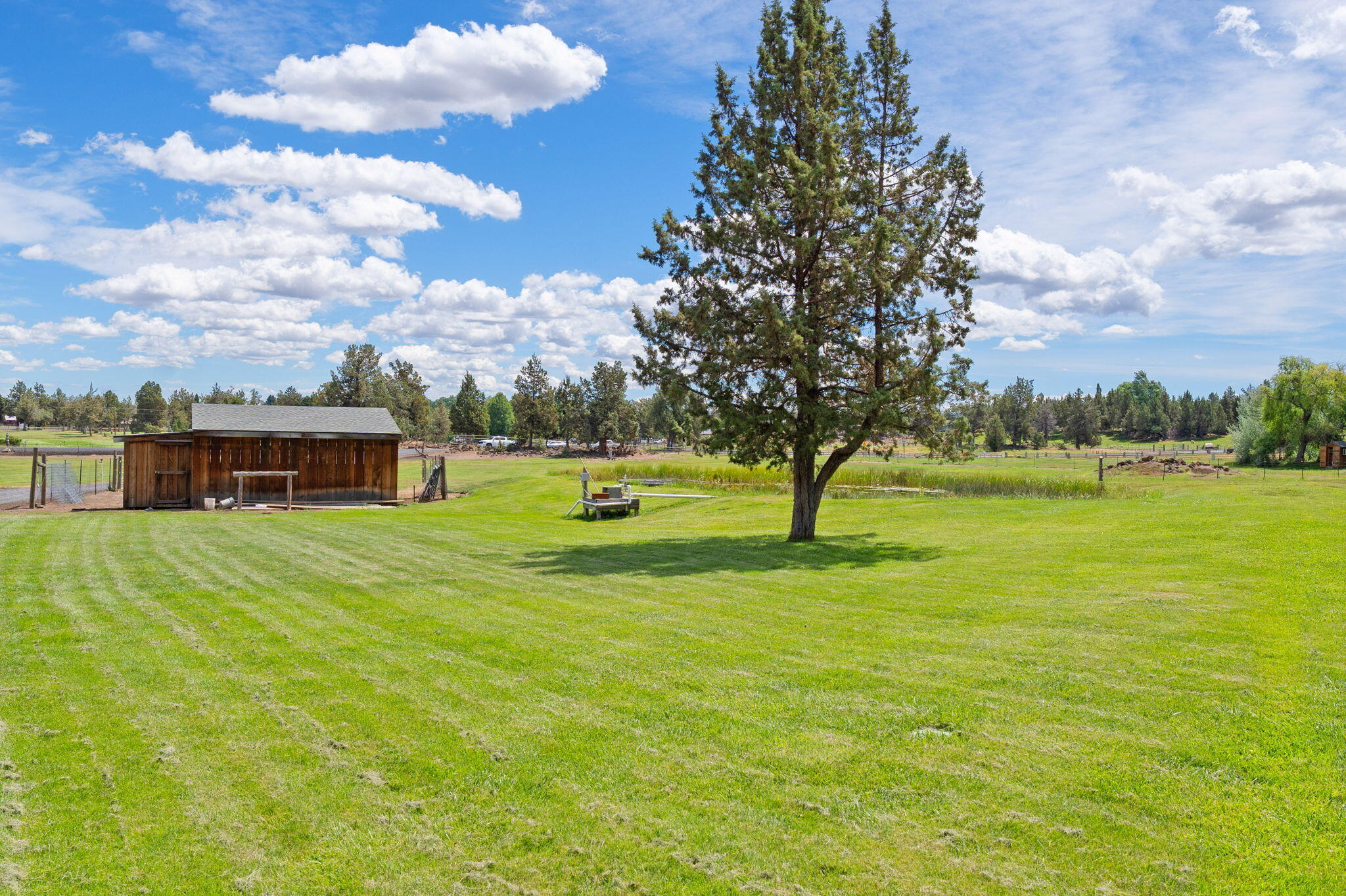 62155 Cody Road Bend, OR 97701 - Photo 53 of 61 a view of a house with a big yard