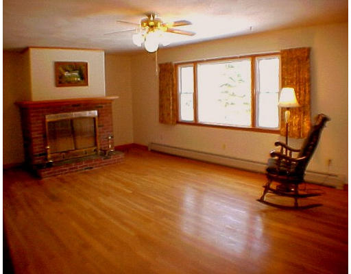 9 Edwards Road Westhampton, MA 01027 - Photo 3 of 7 a view of an empty room with furniture window and wooden floor