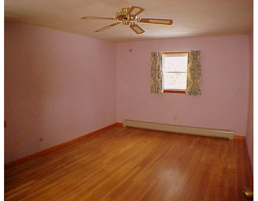 9 Edwards Road Westhampton, MA 01027 - Photo 4 of 7 an empty room with a window and ceiling fan