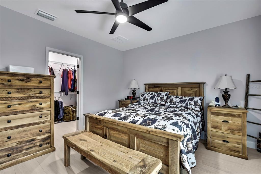 3276 Sea Grape Drive Hernando Beach, FL 34607 - Photo 18 of 55 a bed room with a bed and a window