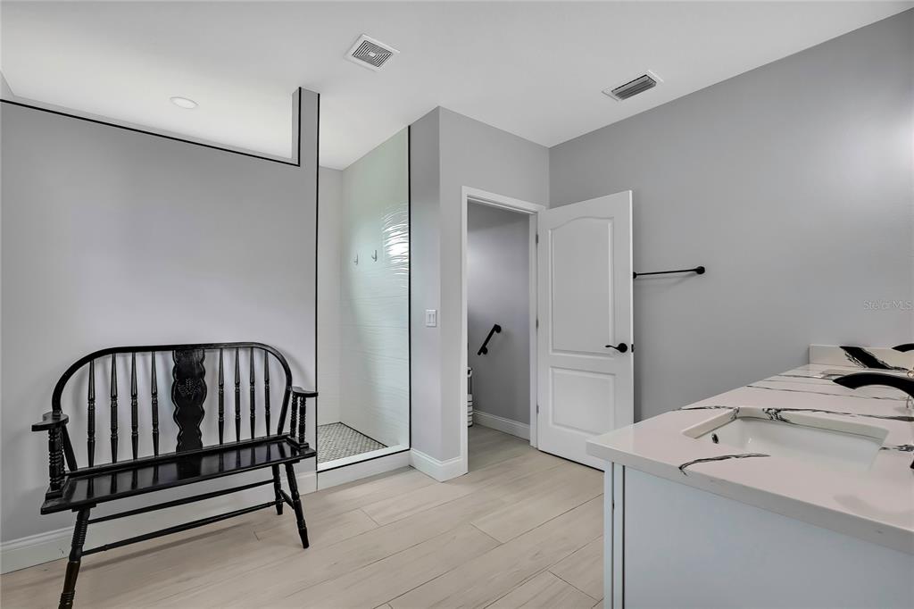 3276 Sea Grape Drive Hernando Beach, FL 34607 - Photo 19 of 55 a bedroom with a bed and a window