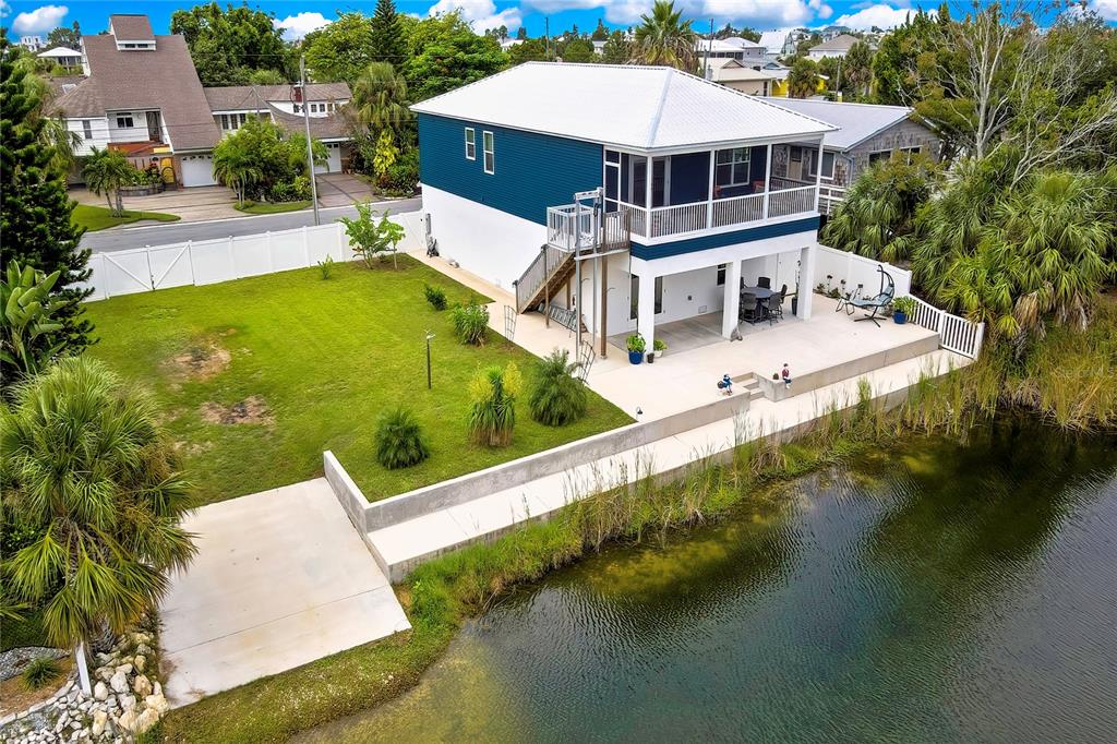 3276 Sea Grape Drive Hernando Beach, FL 34607 - Photo 2 of 55 an aerial view of a house with swimming pool