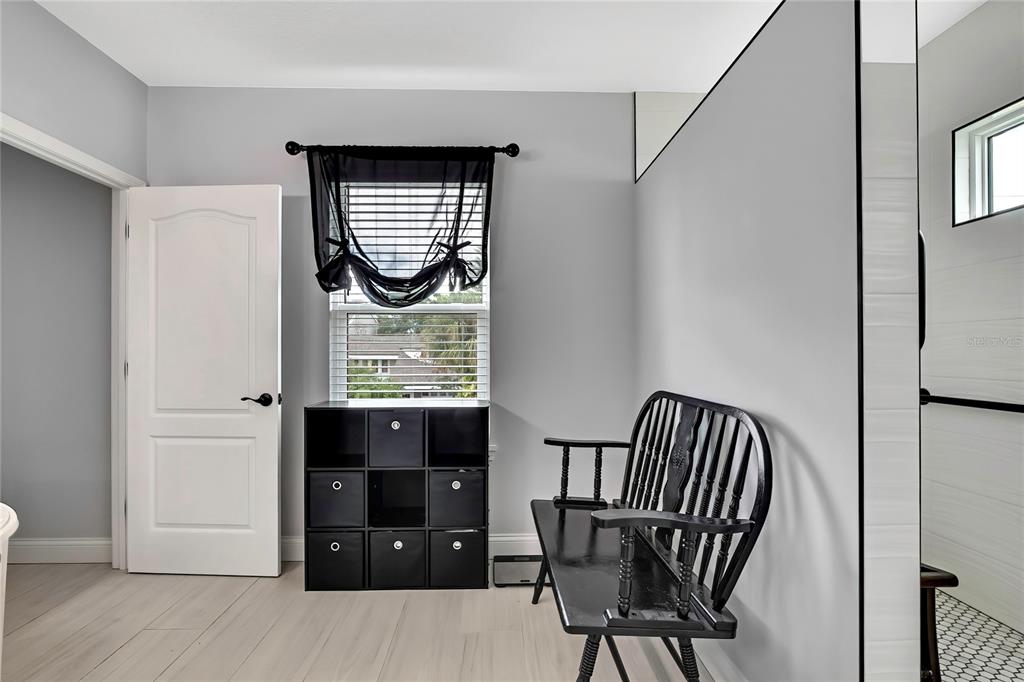 3276 Sea Grape Drive Hernando Beach, FL 34607 - Photo 22 of 55 a view of a hallway with wooden floor and staircase