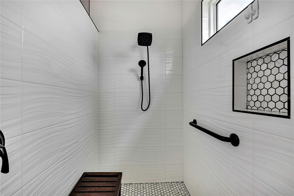 3276 Sea Grape Drive Hernando Beach, FL 34607 - Photo 23 of 55 a bathroom with a shower