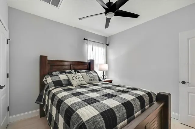 a view of a chairs and table in patio