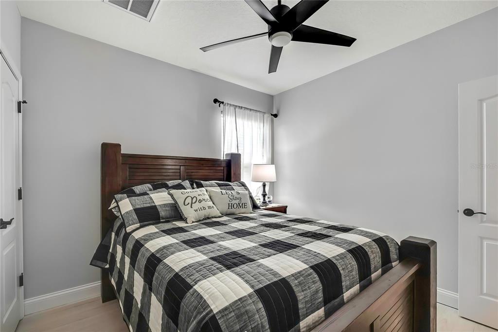 3276 Sea Grape Drive Hernando Beach, FL 34607 - Photo 30 of 55 a bedroom with a bed and window