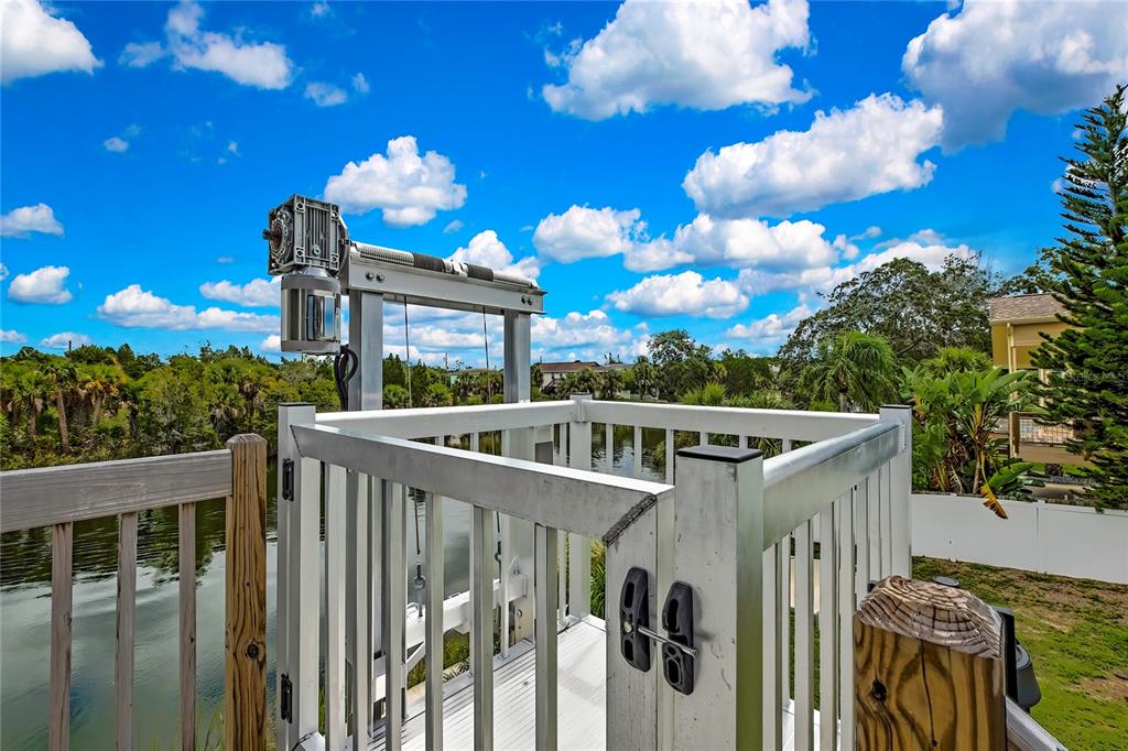 3276 Sea Grape Drive Hernando Beach, FL 34607 - Photo 35 of 55 a view of a house with a balcony