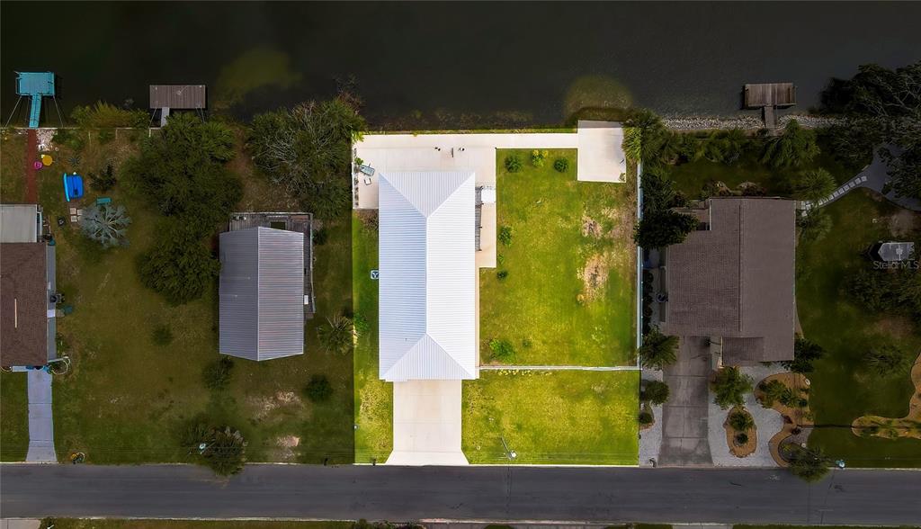 3276 Sea Grape Drive Hernando Beach, FL 34607 - Photo 50 of 55 an aerial view of a residential houses