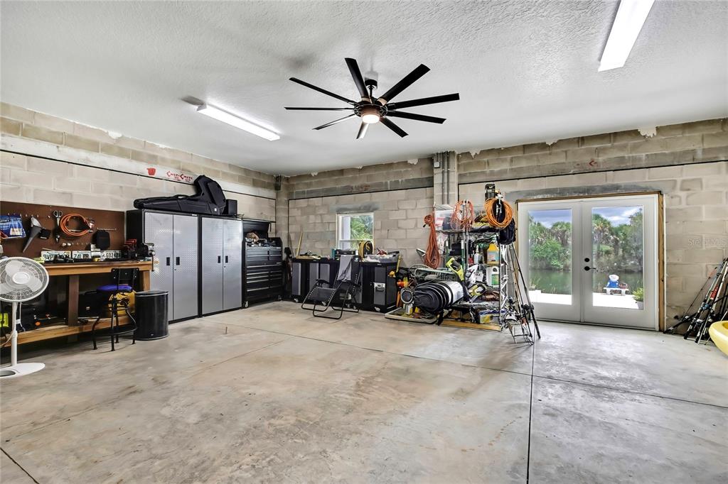 3276 Sea Grape Drive Hernando Beach, FL 34607 - Photo 54 of 55 a view of a garage with furniture