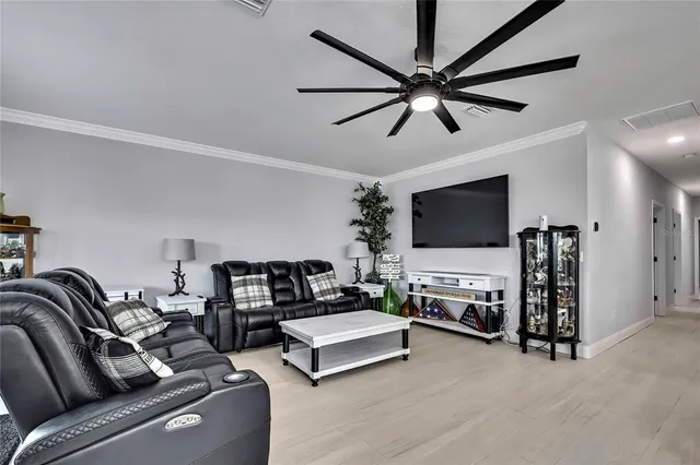 a kitchen with a table chairs stove and cabinets