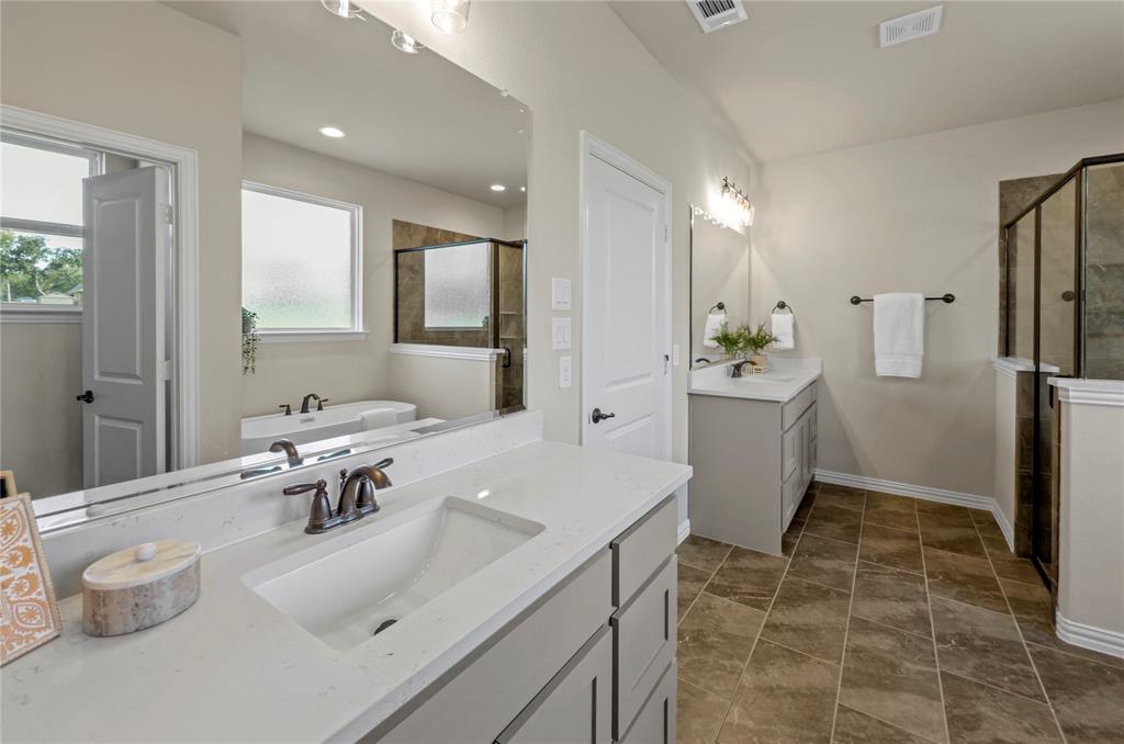 205 Stuart Paradise, TX 76073 - Photo 18 of 33 a bathroom with a sink toilet and shower