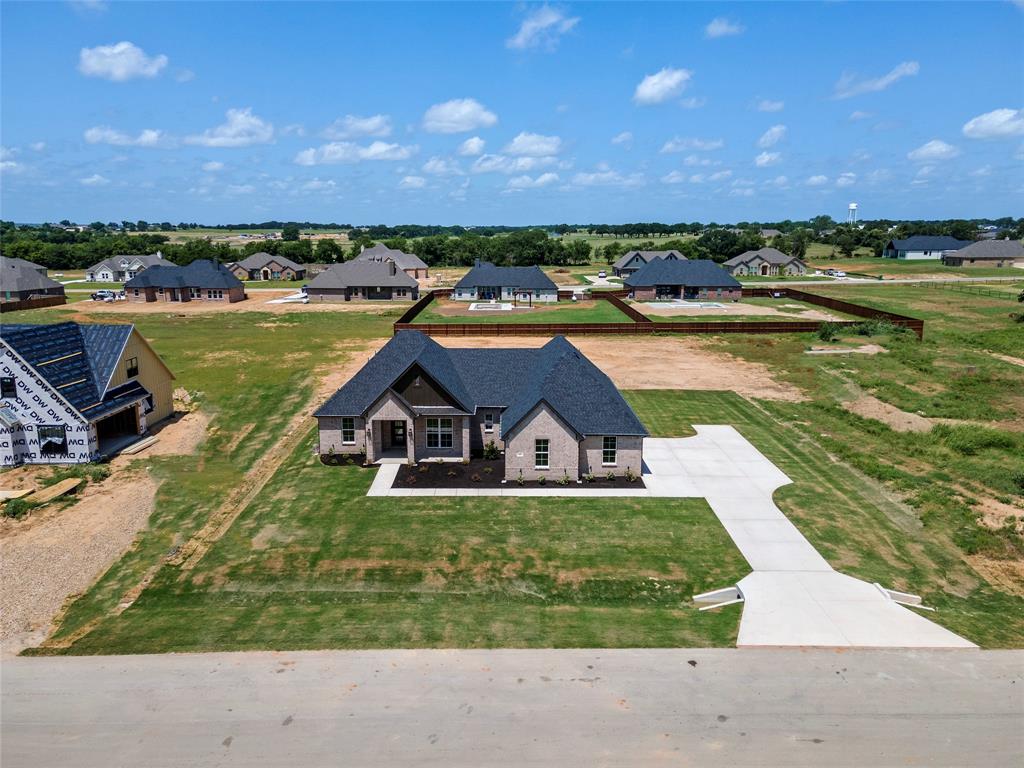 205 Stuart Paradise, TX 76073 - Photo 30 of 33 an aerial view of a house with a garden and lake view