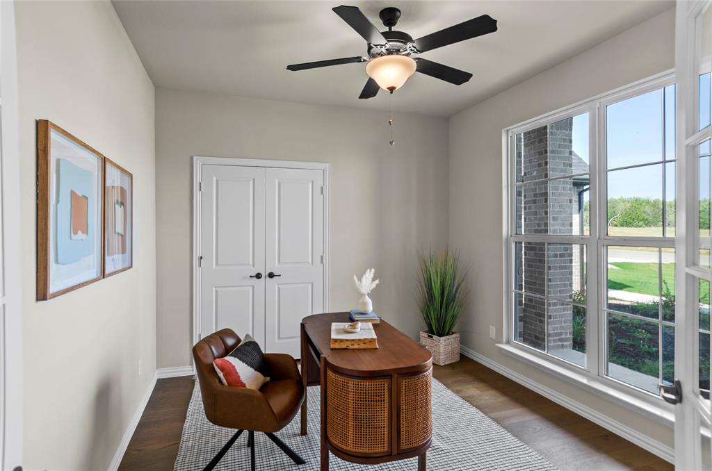 205 Stuart Paradise, TX 76073 - Photo 6 of 33 a view of a workspace with furniture and a window
