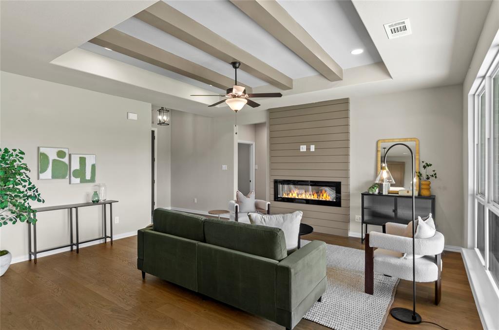 205 Stuart Paradise, TX 76073 - Photo 8 of 33 a living room with furniture and a fireplace