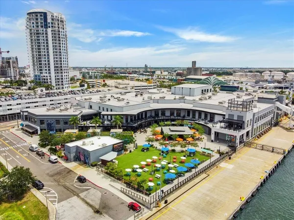 an aerial view of a house with lake view