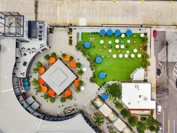a view of swimming pool with a table and chairs