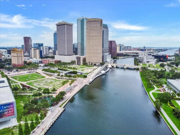 a view of a city with tall buildings