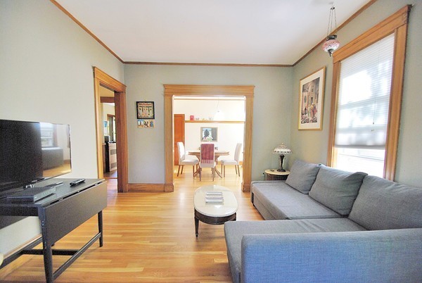 90 Montebello Road, Unit 3 Boston, MA 02130 - Photo 2 of 11 a living room with furniture and a flat screen tv