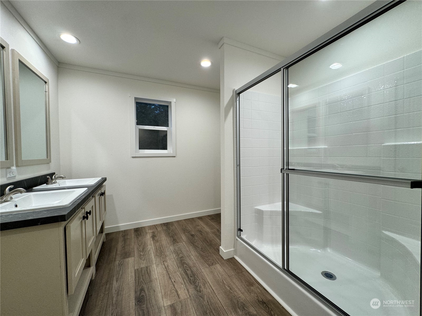 122 Ward Road Longview, WA 98632 - Photo 15 of 21 a bathroom with a sink mirror and shower