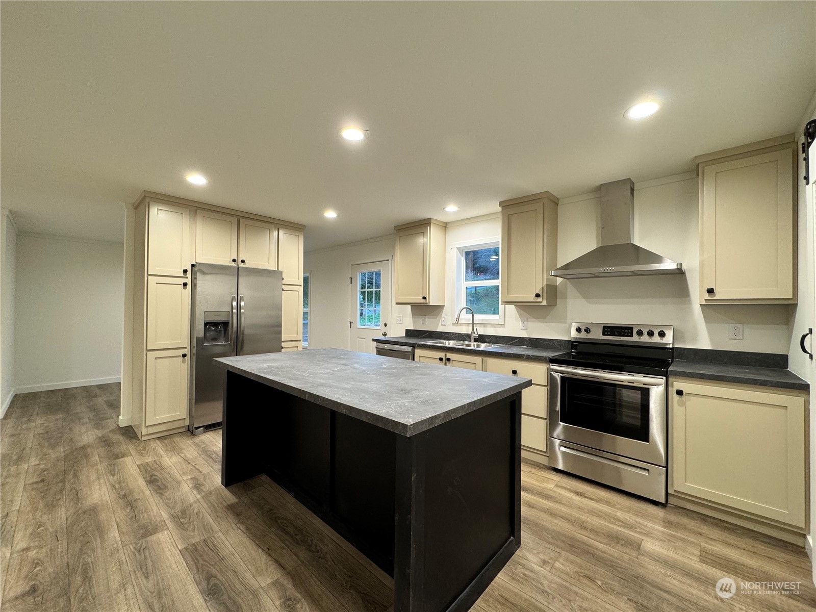122 Ward Road Longview, WA 98632 - Photo 5 of 21 a kitchen with stainless steel appliances granite countertop a stove and a sink