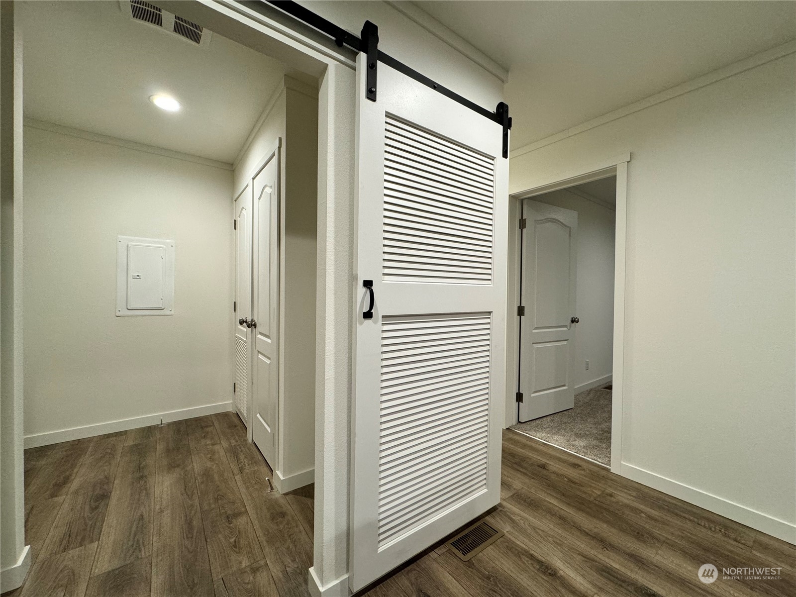 122 Ward Road Longview, WA 98632 - Photo 9 of 21 a view of a room with wooden floor and a bathroom