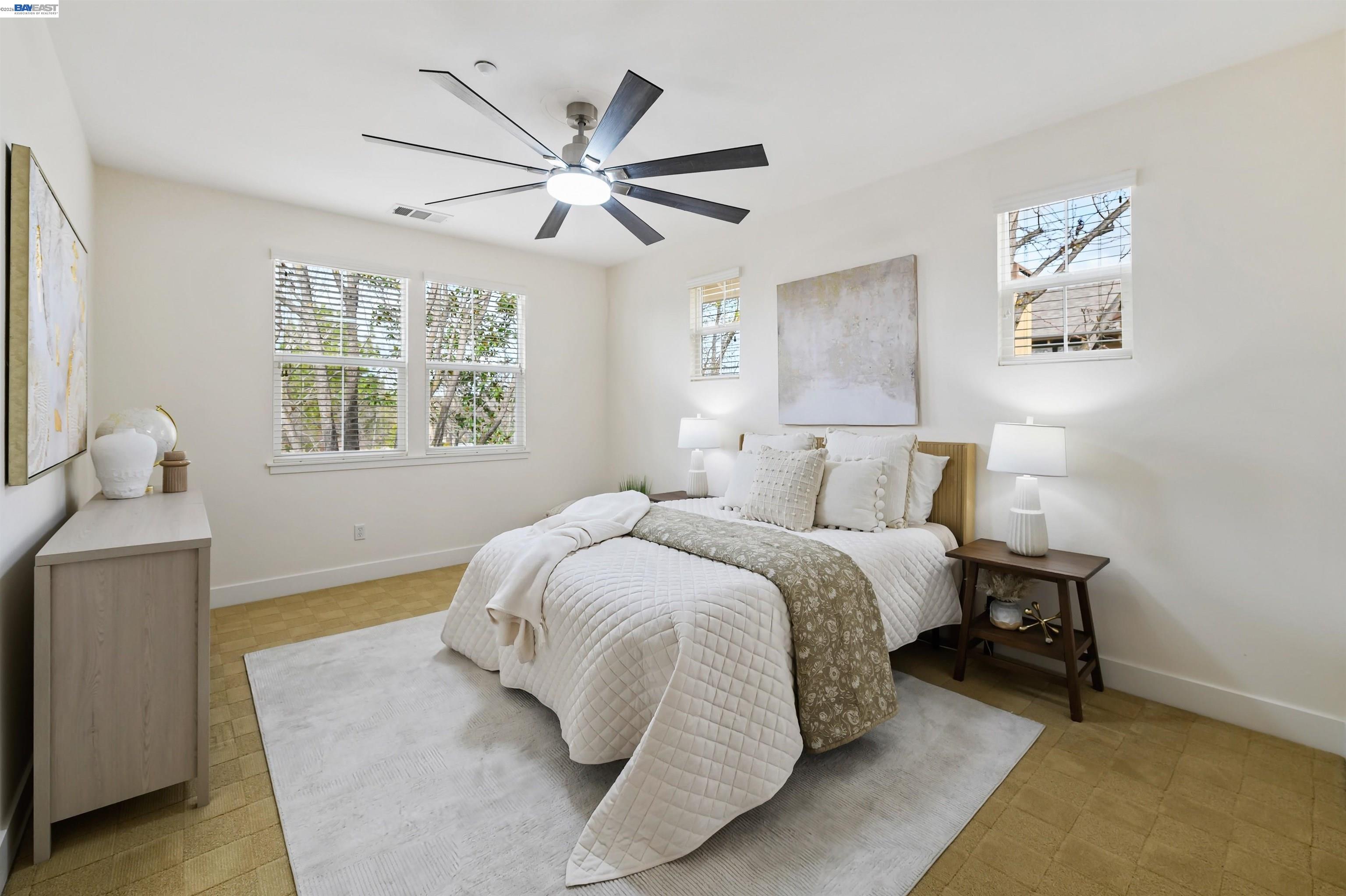 5454 Stockton Loop Livermore, CA 94550 - Photo 17 of 35 a bedroom with a bed and wooden floor