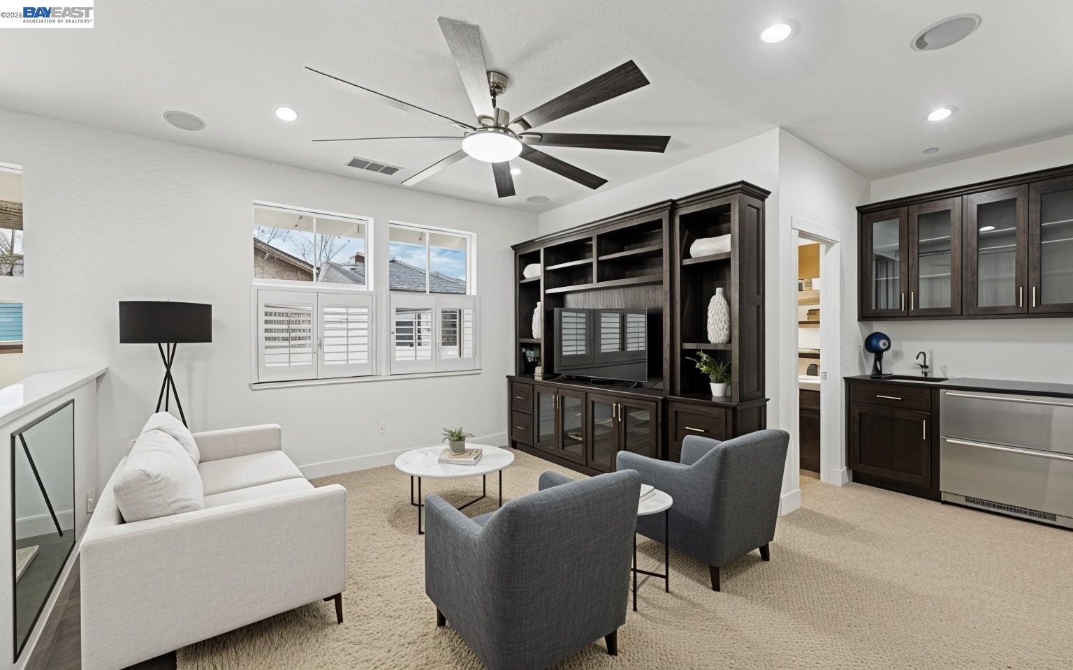 5454 Stockton Loop Livermore, CA 94550 - Photo 20 of 35 a living room with furniture and a flat screen tv