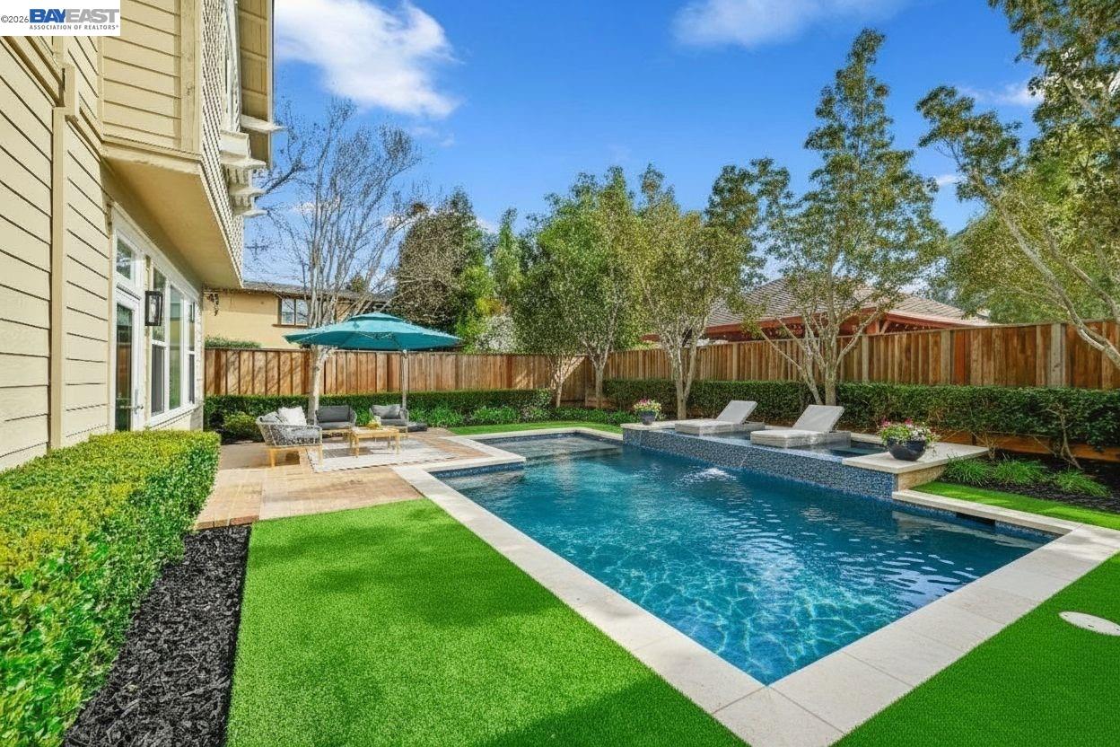 5454 Stockton Loop Livermore, CA 94550 - Photo 30 of 35 a view of a backyard with a garden