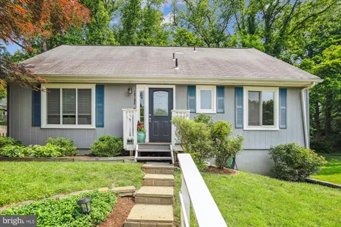 a front view of a house with a porch