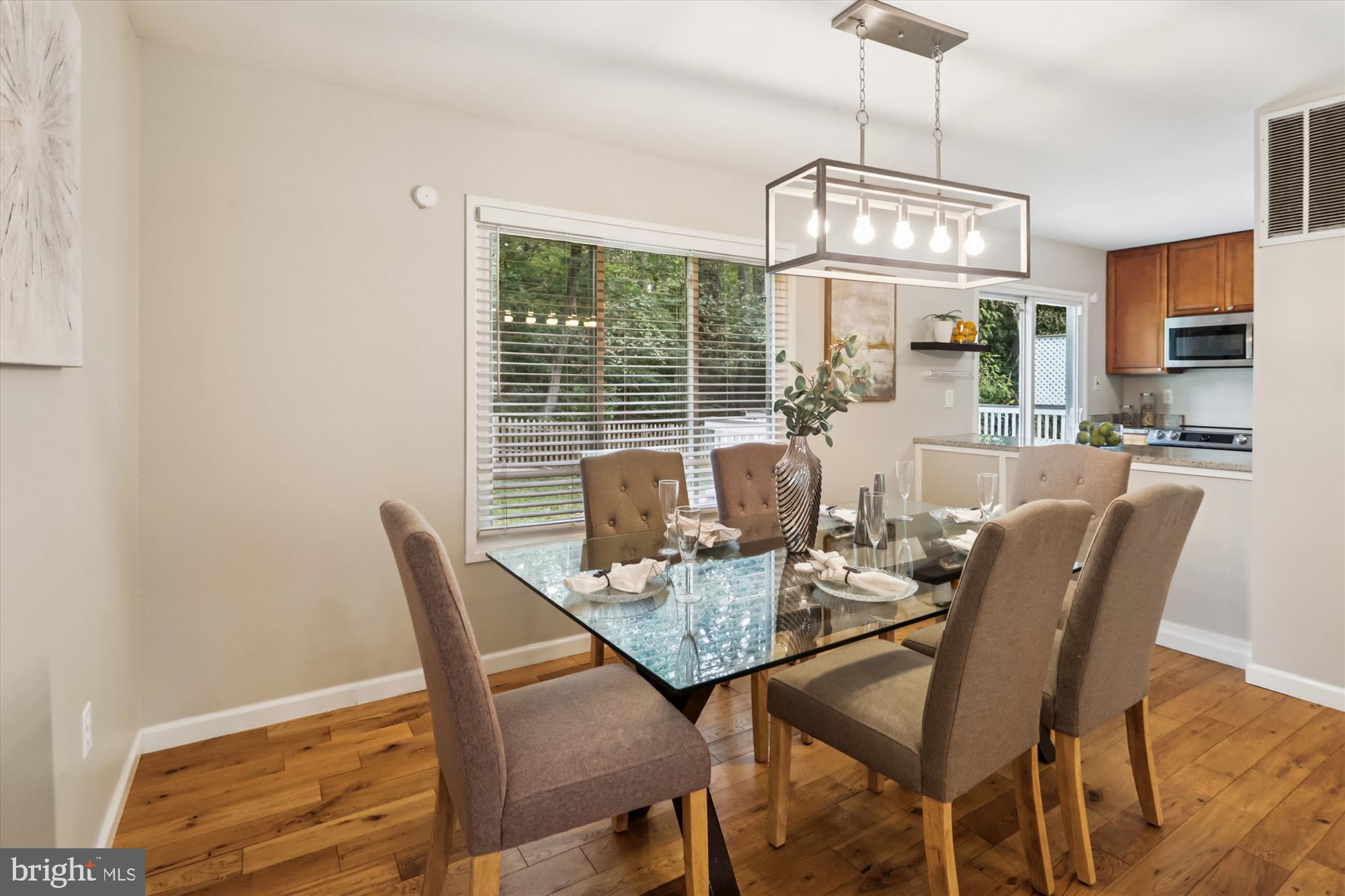10105 Meredith Avenue Silver Spring, MD 20910 - Photo 13 of 76 a view of a dining room with furniture window and outside view