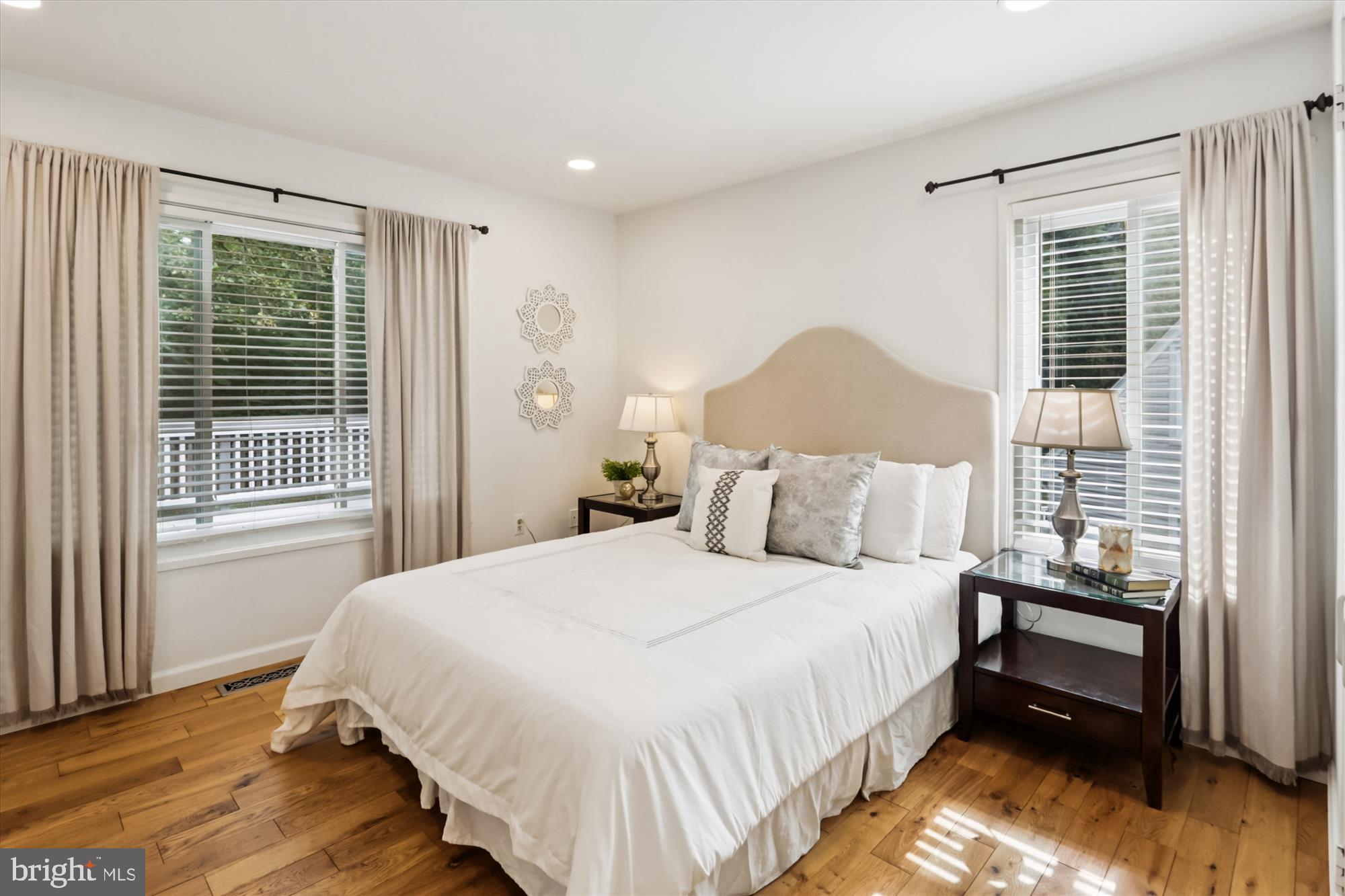 10105 Meredith Avenue Silver Spring, MD 20910 - Photo 21 of 76 a bedroom with a bed and a window