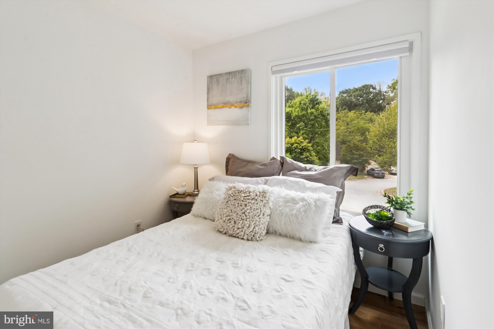 10105 Meredith Avenue Silver Spring, MD 20910 - Photo 28 of 76 a bedroom with a bed and a window