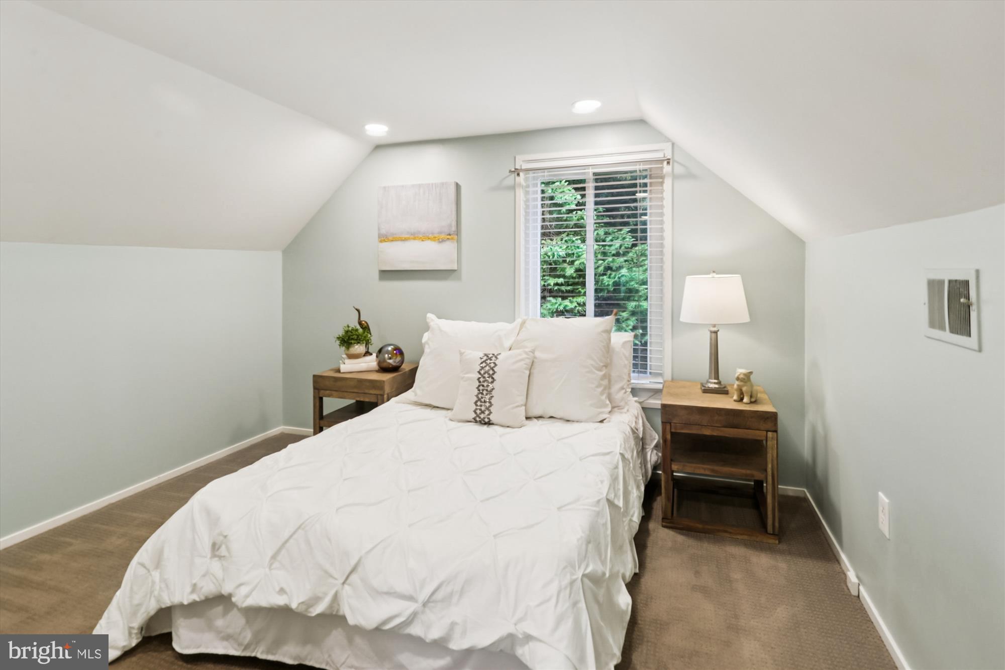 10105 Meredith Avenue Silver Spring, MD 20910 - Photo 34 of 76 a bedroom with a bed and a window