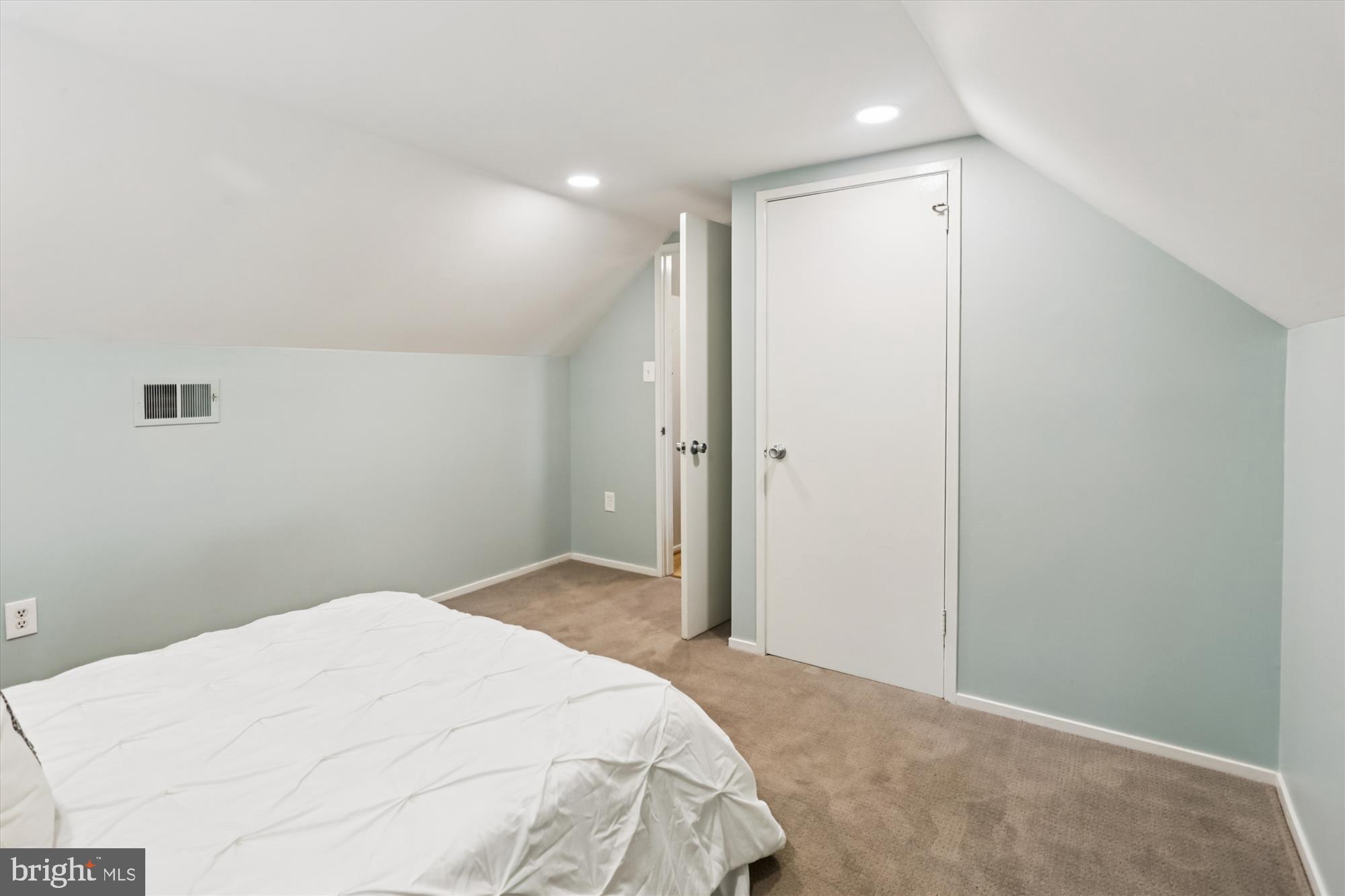 10105 Meredith Avenue Silver Spring, MD 20910 - Photo 35 of 76 a bedroom with a bed and a fan