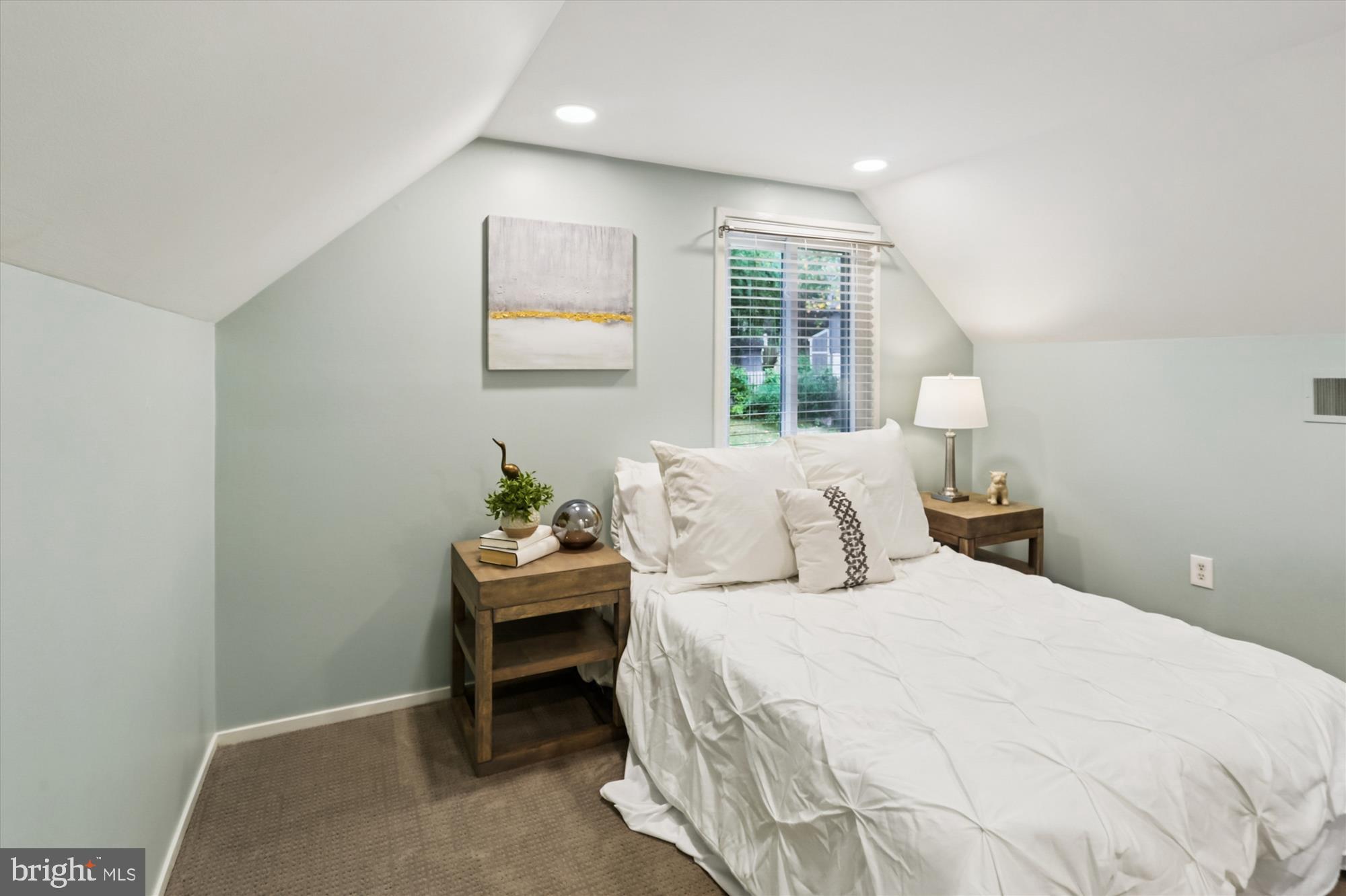 10105 Meredith Avenue Silver Spring, MD 20910 - Photo 36 of 76 a bedroom with a bed and a window