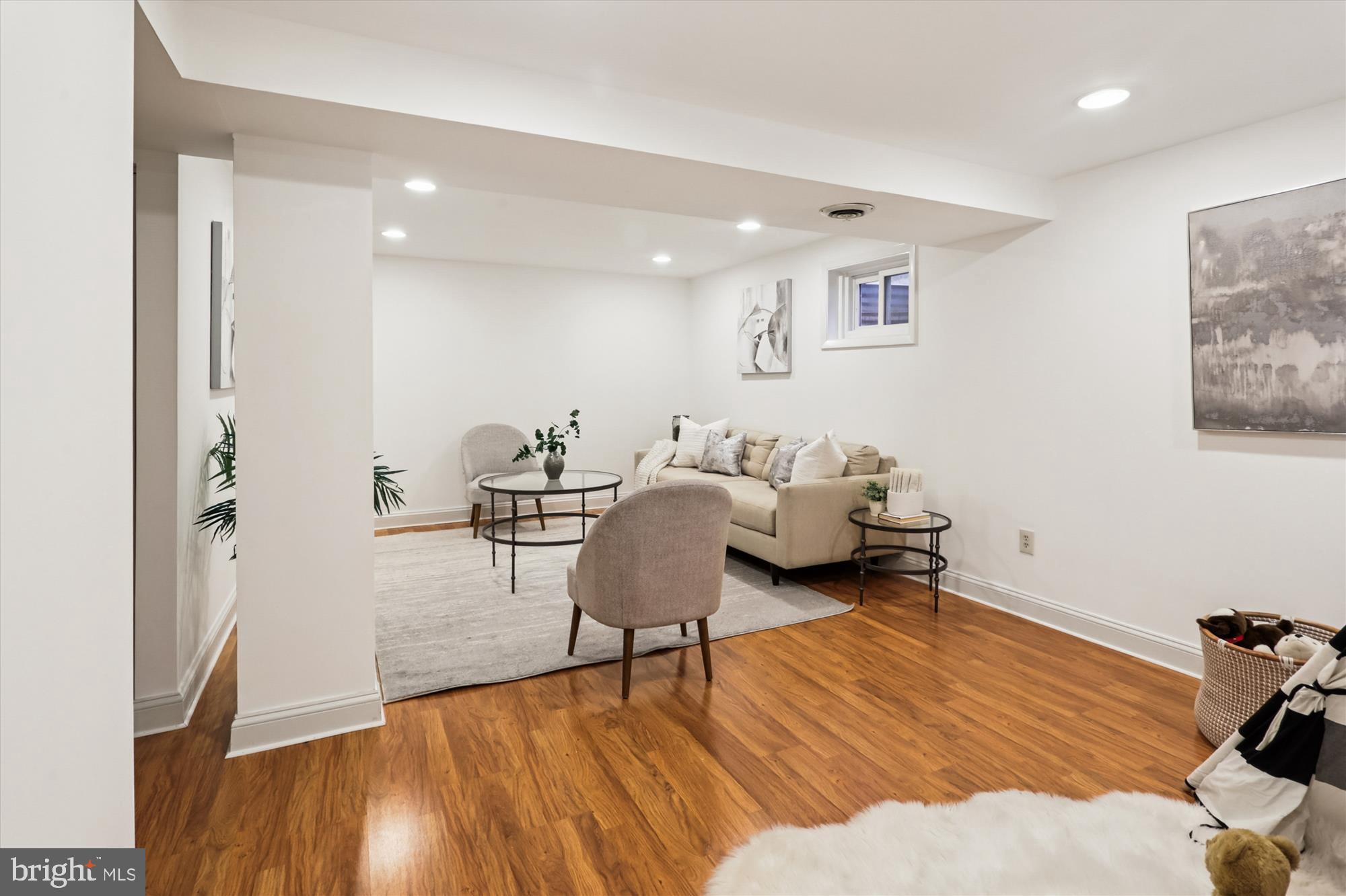 10105 Meredith Avenue Silver Spring, MD 20910 - Photo 44 of 76 a living room with furniture and a wooden floor
