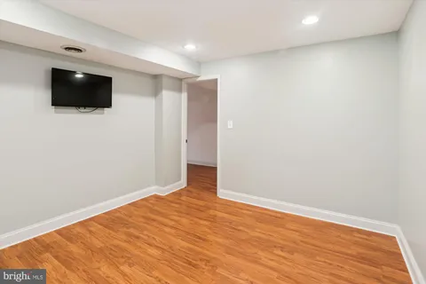 a picture of a room with a white wall and a picture of a picture