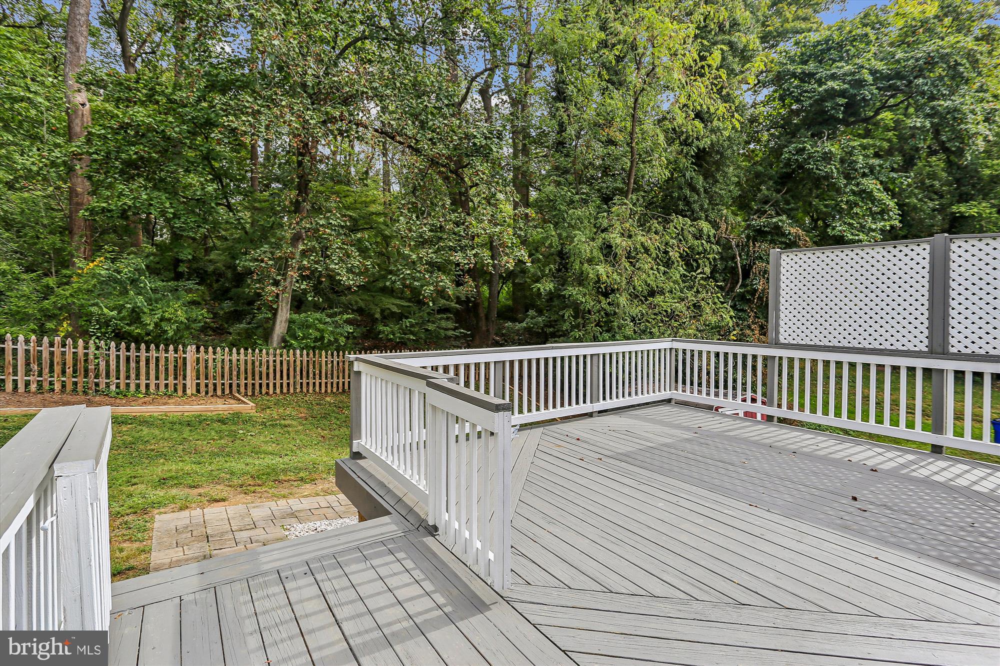 10105 Meredith Avenue Silver Spring, MD 20910 - Photo 55 of 76 a view of a wooden deck with a yard