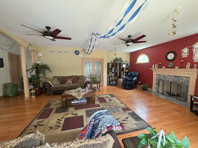 a dining room with furniture and window