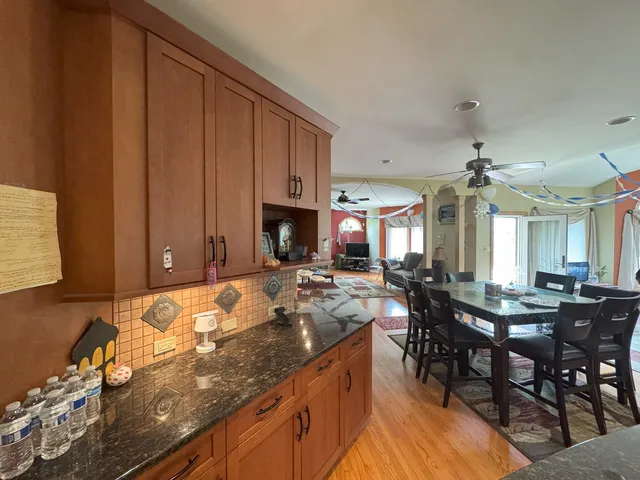 a bedroom with a bed and dresser