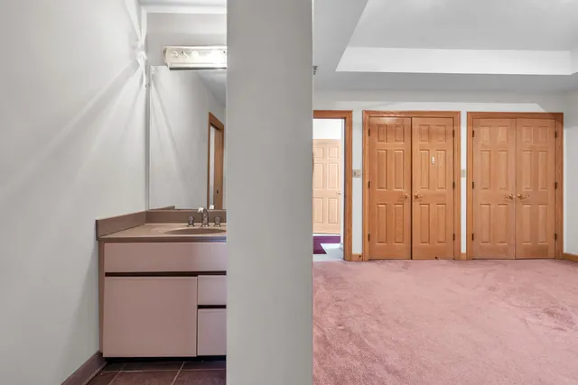 a view of staircase with lots of furniture and a window