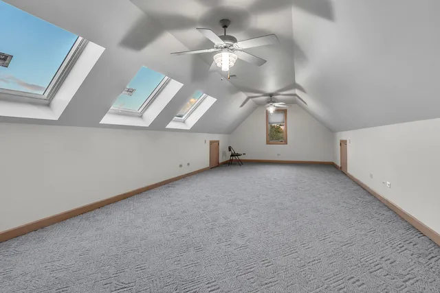 a view of an empty room with closet