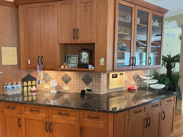 a living room with furniture a window and a table