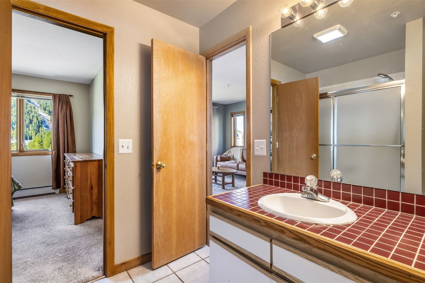 60 Oro Grande Road, Unit 204 Keystone, CO 80435 - Photo 20 of 50 a bathroom with a sink and a mirror