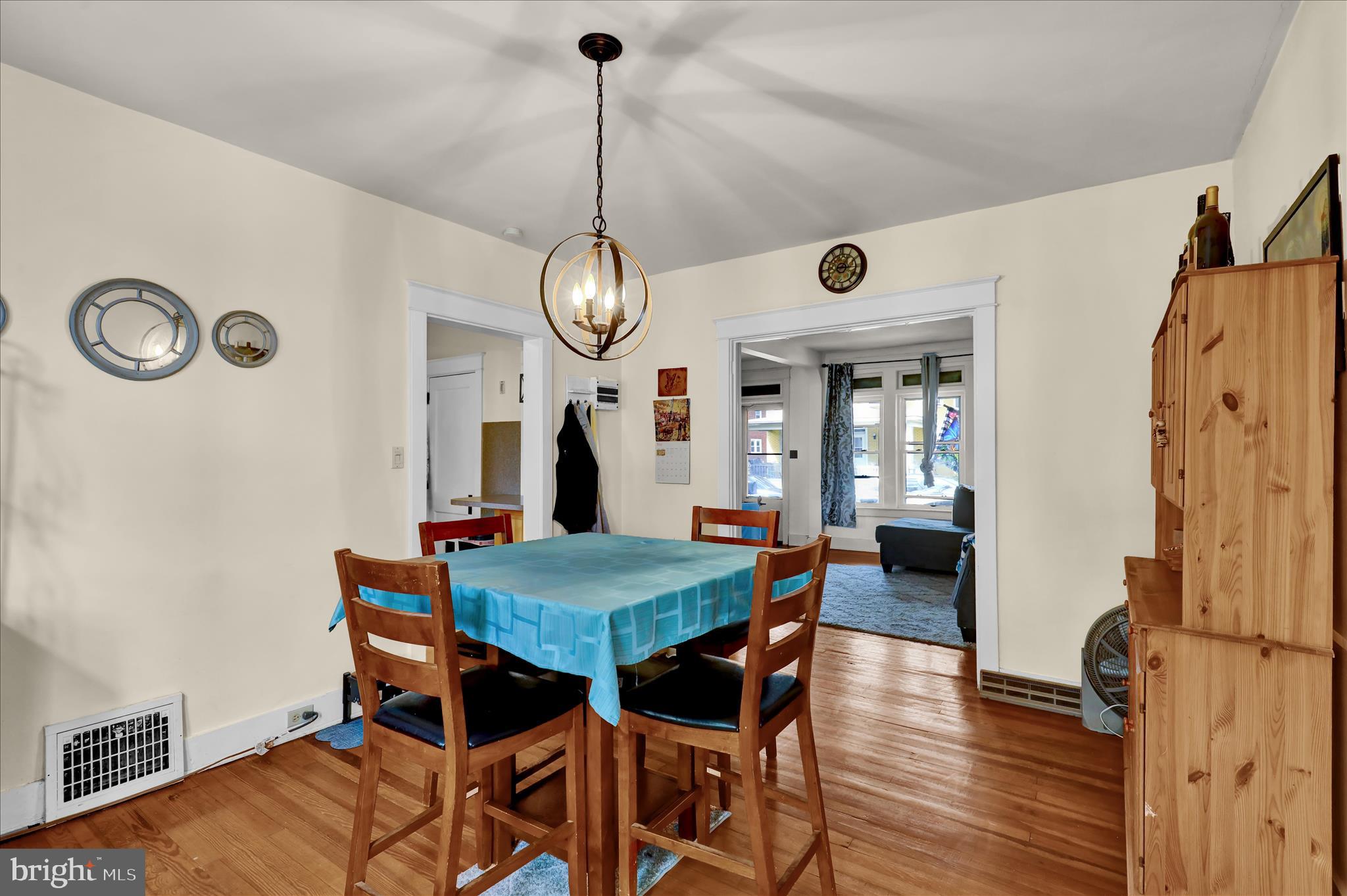 43 East Walnut Street Ephrata, PA 17522 - Photo 10 of 32 a view of a dining room with furniture and wooden floor