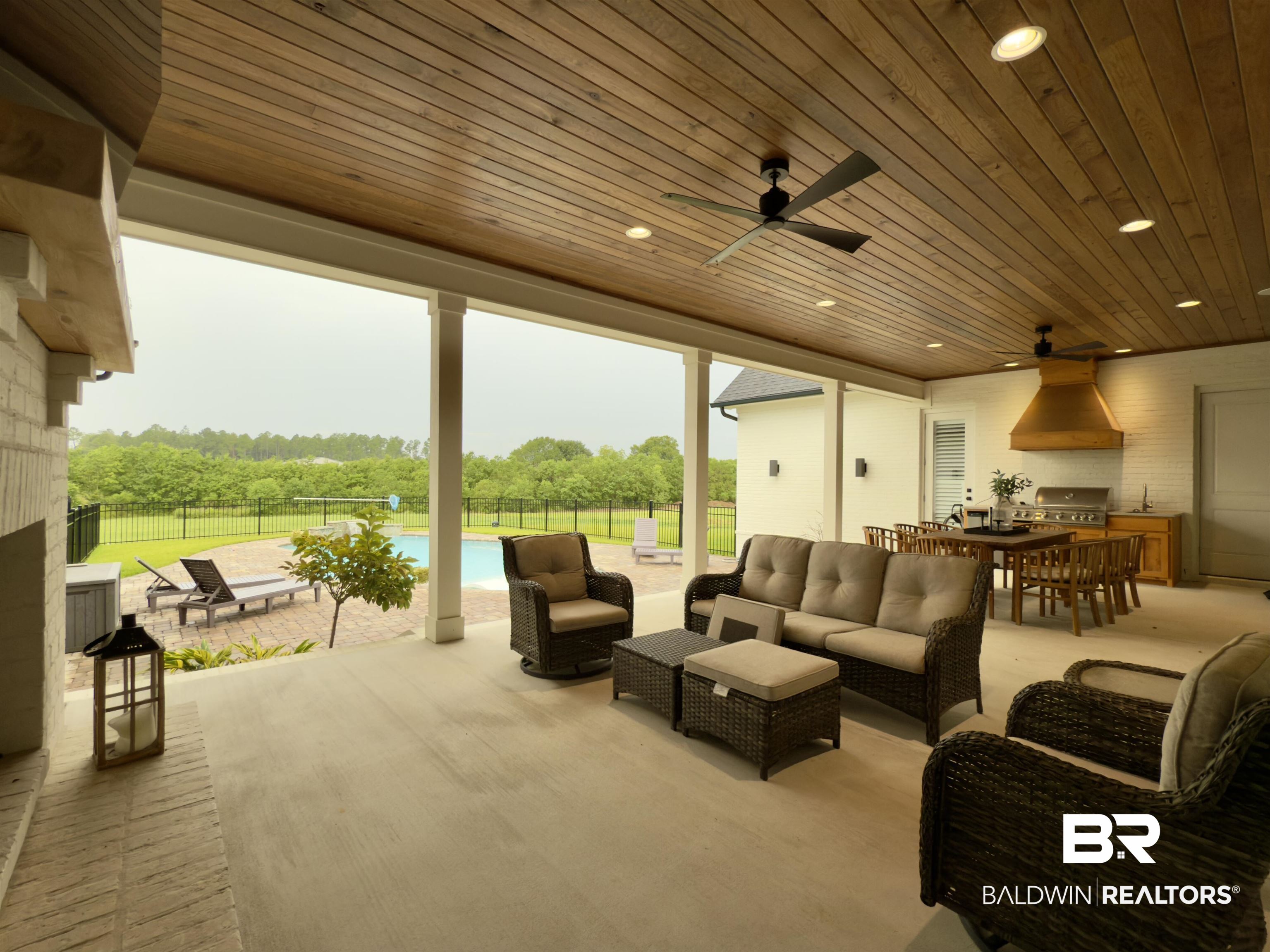 21767 Gallery Boulevard Fairhope, AL 36532 - Photo 63 of 74 View of patio / terrace with an outdoor living space, a ceiling fan, area for grilling, and outdoor dining area